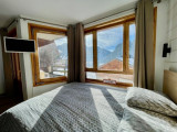 Lit double et tv - Studio Val Pierre